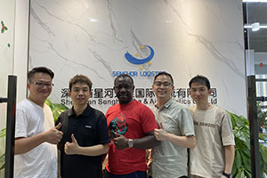 senghor-logistics-with-african-customer-in-our-office